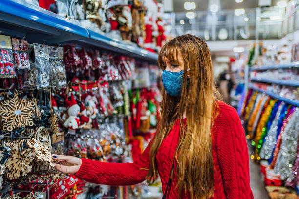 istock Woman buying decorations for Christmas tree 1286755207