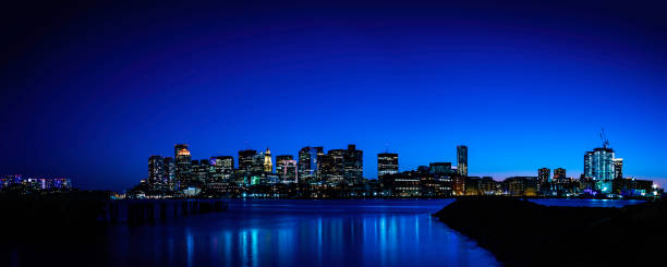 istock Panoramic Blue Night Skyline of Boston City 1286755392