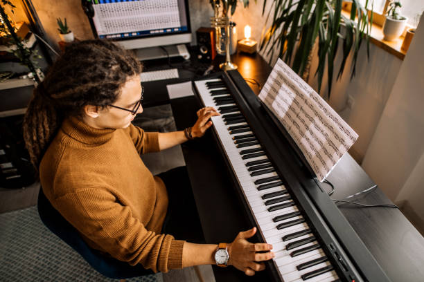 istock Evening lessons of piano playing 1286758814