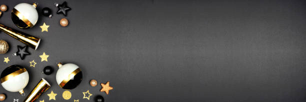 istock New Years Eve corner border. Overhead view on a black background. 1286758998