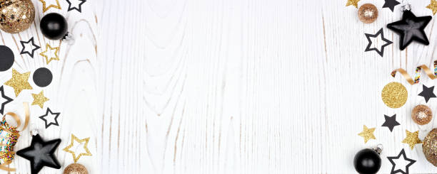 istock New Years Eve double border. Above view over a white wood background. 1286759021