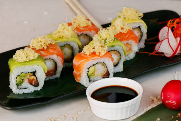 istock japanese sushi rolls with avocado, salmon and soy sauce 1286762455