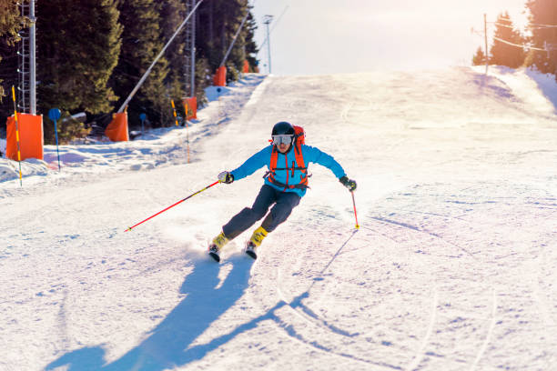 istock Young man on the ski track, making a perfect turn 1286765185