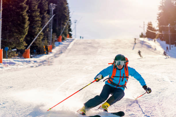 istock Front view of a male athlete skiing down the ski track 1286765187