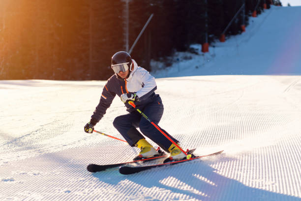 istock Male skier making a turn on ski slope 1286765233