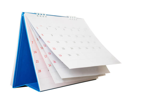 white paper schreibtisch kalender flipping seite mockup isoliert auf weißem hintergrund - desk nobody color image day stock-fotos und bilder