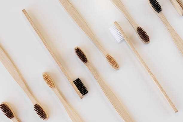 istock Group of eco bamboo toothbrushes, on white background. Different color. Top view, copy space. Natural organic product for oral hygiene. Dental zero waste and no plastic concept. Safe for the earth. 1286774837