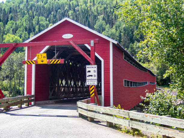 istock Front view of de Routhierville bridge, Municipality of Routhierville, Bas-St-Laurent, Quebec, Canada. 1286781796