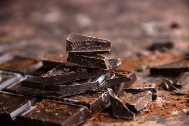 istock Dark chocolate sprinkled with cocoa powder 1286796009