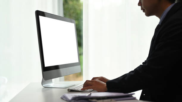 istock Side view of a freelance graphic designer man is working on computer at his modern workspace. 1286801868
