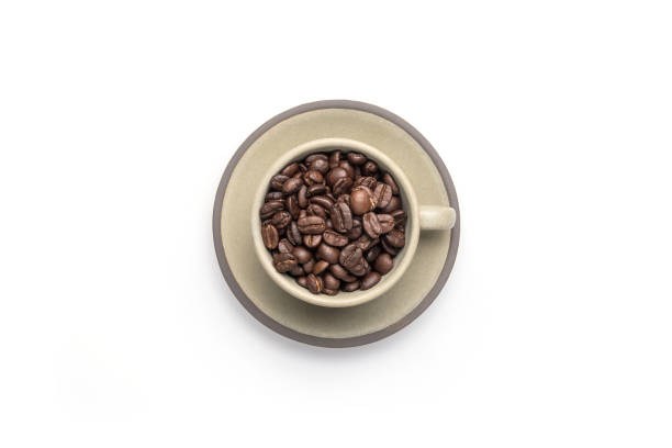 istock Cup and coffee beans, isolated on a white background. Full frame 1286808253