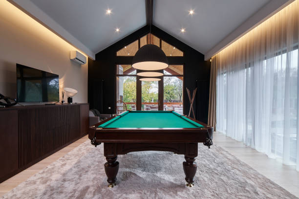 istock modern billiard room with a beautiful table and large windows 1286809860