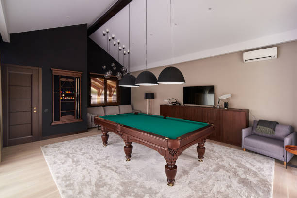 istock modern billiard room with a beautiful table and large windows 1286809862