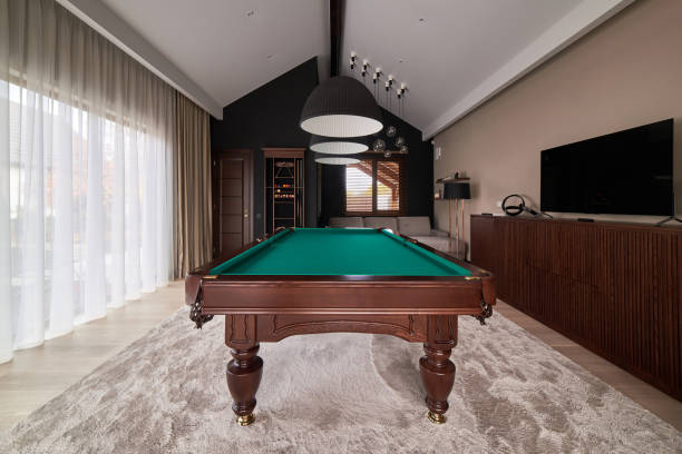 istock modern billiard room with a beautiful table and large windows 1286809863