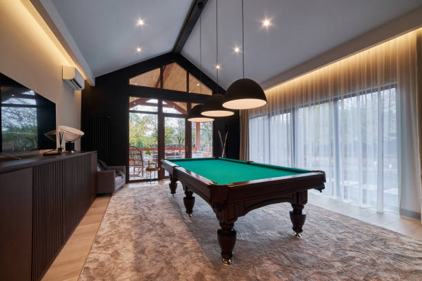 istock modern billiard room with a beautiful table and large windows 1286809866