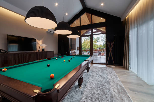 istock modern billiard room with a beautiful table and large windows 1286809869