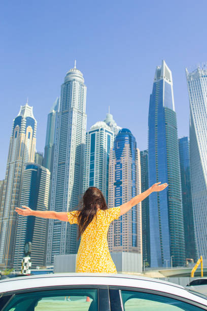istock Summer car trip and young woman on vacation 1286816051