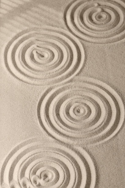 istock Sand surface texture with circles and shadows, for relaxation and spiritual harmony 1286817409