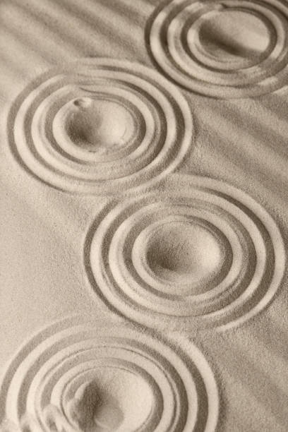 istock Sand surface texture with circles and shadows, for relaxation and spiritual harmony 1286817429