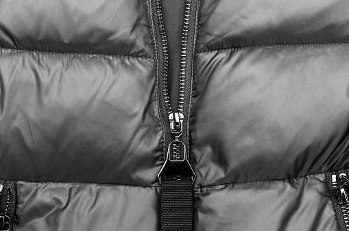 Zipper on the winter jacket. Close up.