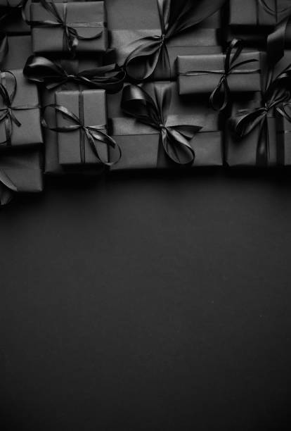 istock A pile various size black boxed gifts placed on stack. Christmas concept 1286819702