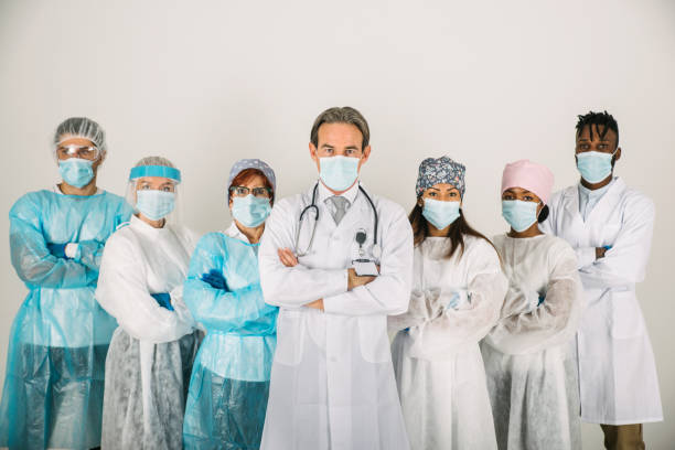 istock Covid-19 medical team with protection equipment 1286828280