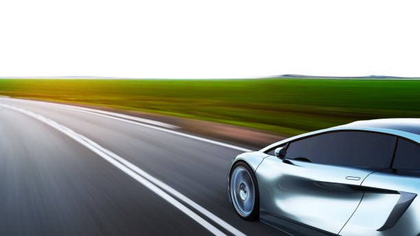 istock gray sportscar driving on a road 1286828406