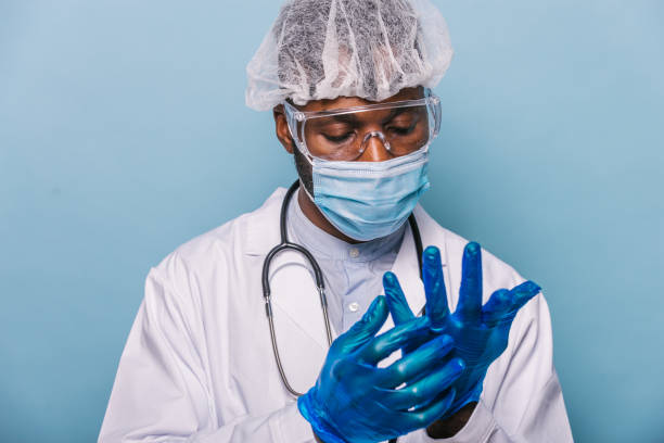 istock Doctor with covid-19 protection equipment 1286830915
