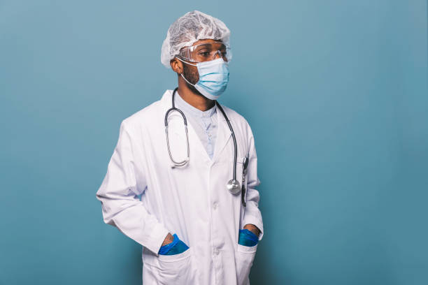 istock Doctor with covid-19 protection equipment 1286830933