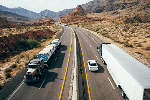 Trucks on a highway in Southwest USA.