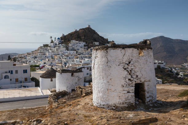 istock Traditional windmills in Chora, Ios Island, Greece. 1286832331