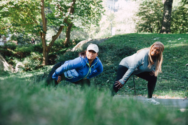 istock Women exercising at the city park 1286832480