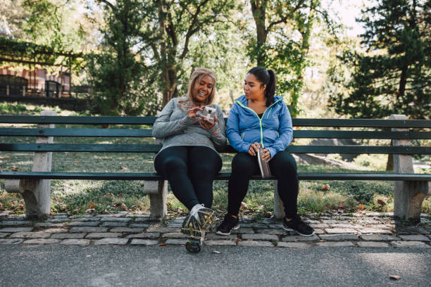 istock Women taking a break after jogging in Central Park 1286833178
