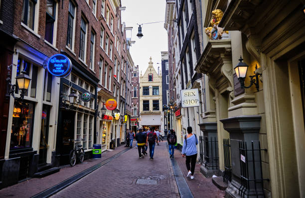 De Wallen, medieval city center and main red-light district of Amsterdam, Netherlands Amsterdam / Netherlands - October 15, 2018: De Wallen, medieval city center and main red-light district of Amsterdam, Netherlands wellen stock pictures, royalty-free photos & images