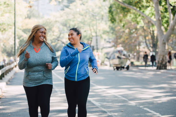 istock Happy women training in the city 1286833601