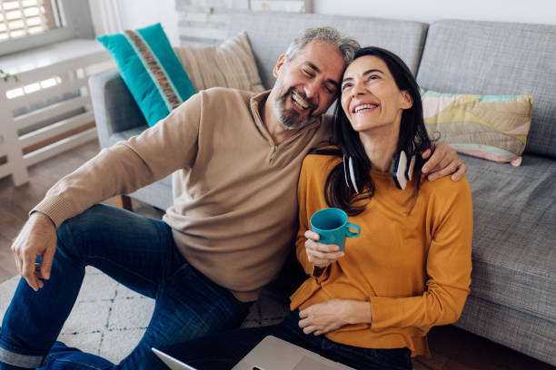 istock Mature couple taking a break from working and enjoying together 1286835184