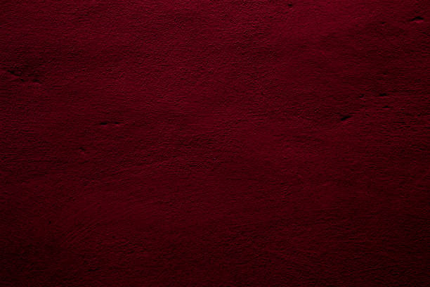 istock Crimson abstract textured wall background in red 1286836847