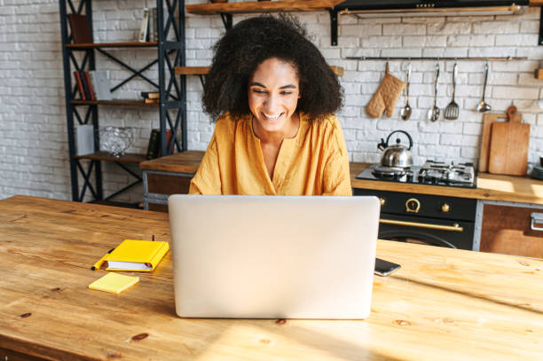 istock A girl uses laptop for remote work or home leisure 1286842818