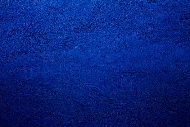 istock Blue colored abstract wall background with textures of different shades of blue 1286844501