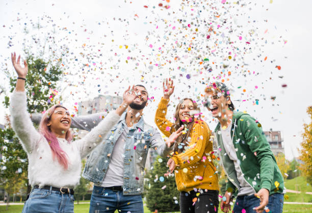 istock Group of young students bonding outdoors 1286845850