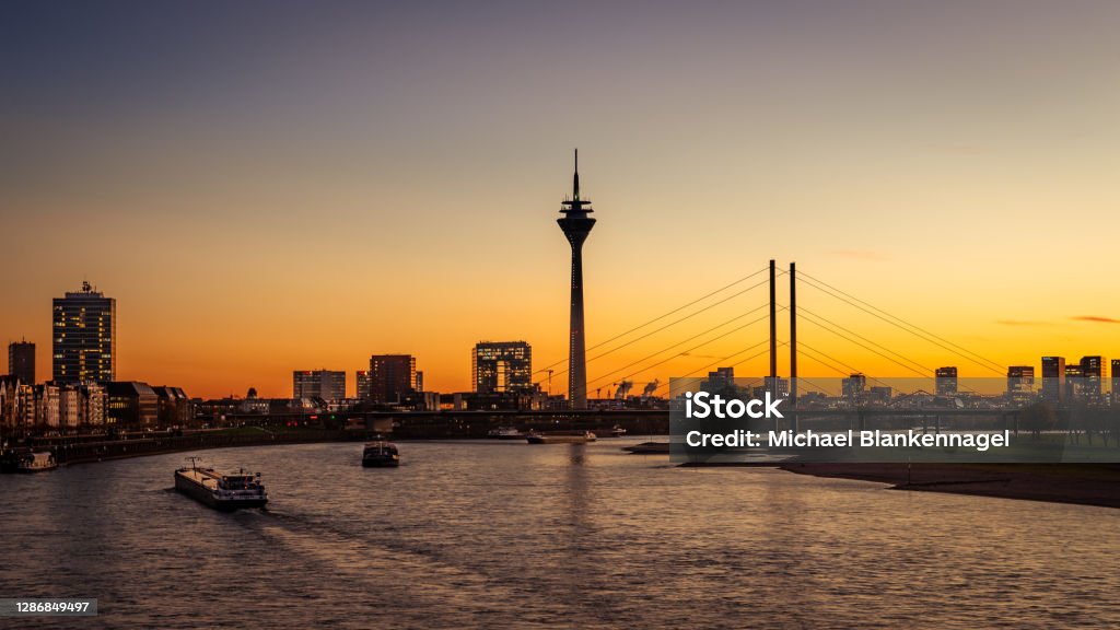 Sunset in Dusseldorf - Germany Sunset in Düsseldorf - You See the Rheinkniebrücke and Rheinturm Düsseldorf Stock Photo