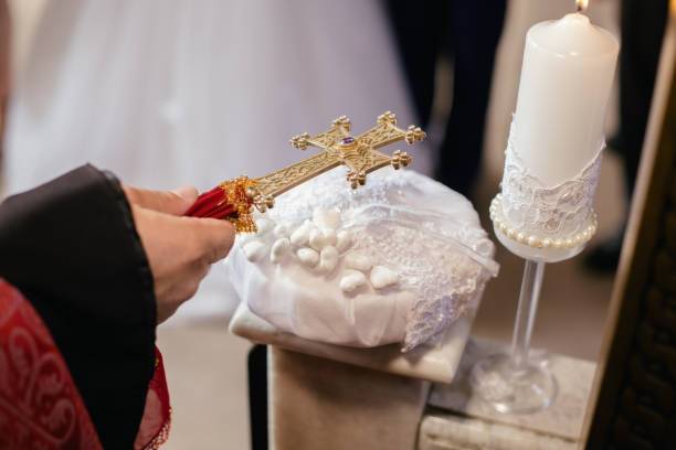 istock Armenian priest holding the cross durign wedding ceremony 1286850560