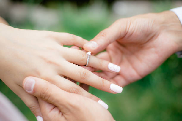istock A boy puts engagement ring in nature 1286851827