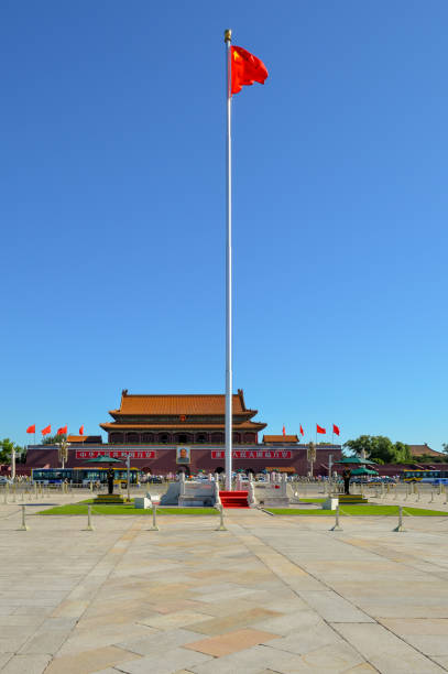 National flag of the Peoples Republic of China at the Tiananmen in Beijing Beijing / China - July 13, 2014: National flag of the Peoples Republic of China at the Tiananmen (Gate of Heavenly Peace), Tiananmen Square in Beijing, China prc stock pictures, royalty-free photos & images