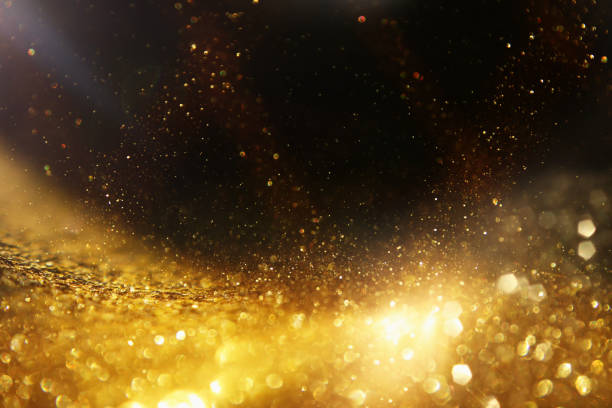 istock background of abstract glitter lights. silver, gold and black. de focused 1286853982