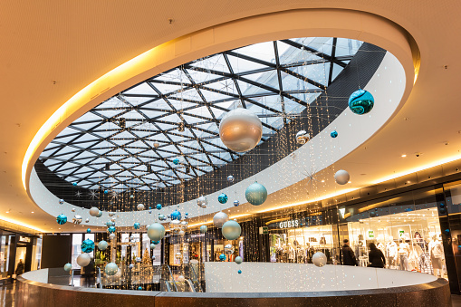 Zurich, Switzerland - November 20. 2020: interior of the Sihlcity shopping mall. It is one of the largest luxury shopping malls in the financial center of Zurich city.