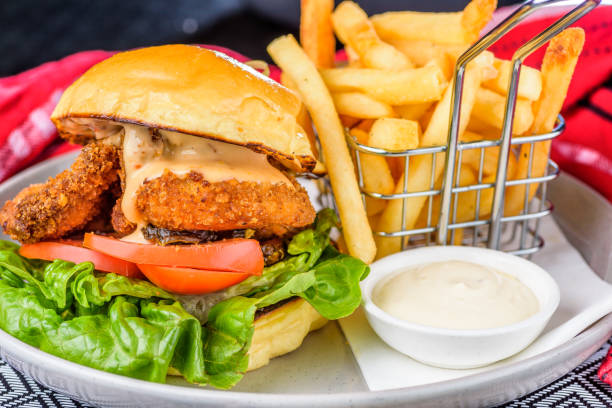 istock A fried chicken burger with lettuce and tomato 1286856234