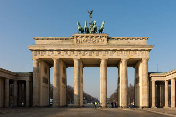 Iconic Brandenburg gate, symbol of Berlin and Germany Berlin / Germany - February 16, 2017: Iconic Brandenburg gate, symbol of Berlin and Germany city gate stock pictures, royalty-free photos & images