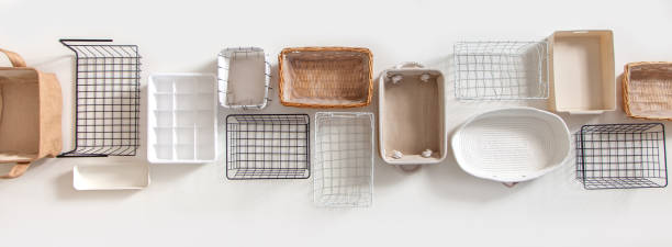 istock Top view of closet organization boxes and steel wire baskets in different shapes 1286859343