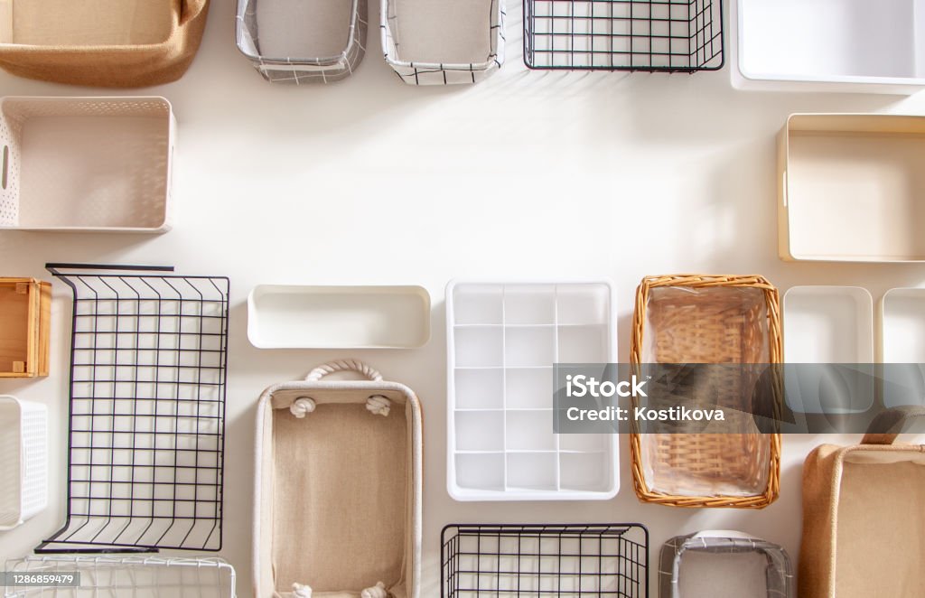 Top View Of Closet Organization Boxes And Steel Wire Baskets In Different  Shapes Stock Photo - Download Image Now - iStock